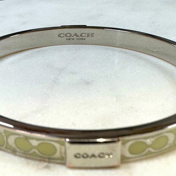 COACH - Signature C Cream Enameled Silver Bangle Bracelet - Picture 9 of 12
